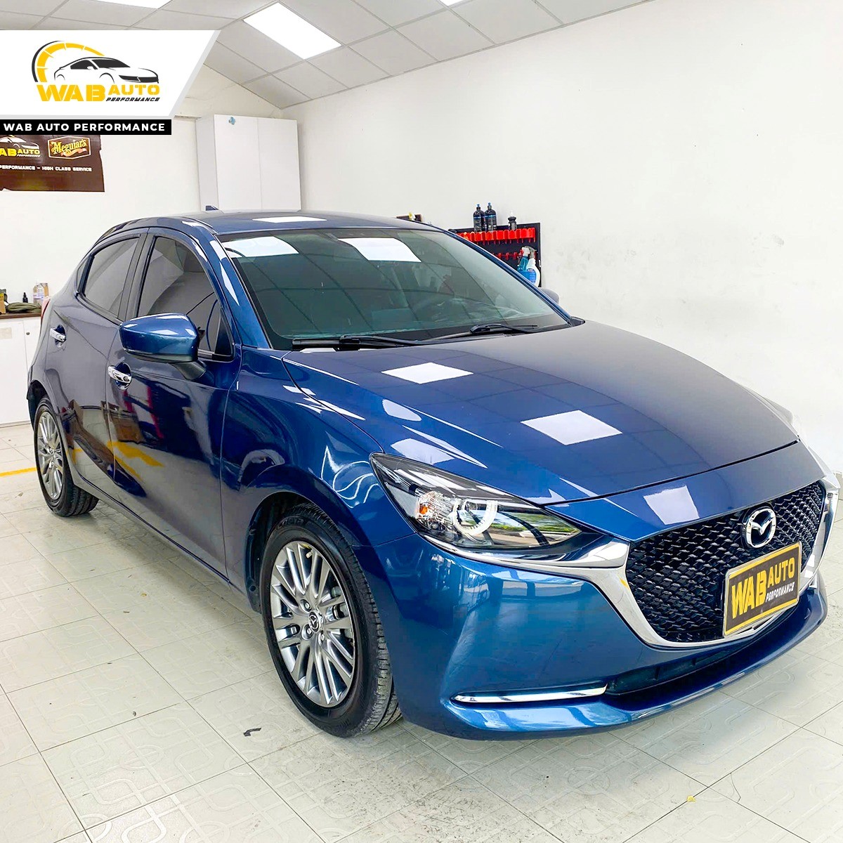 dich-vu-ve-sinh-mam-lop-xe-mazda-2-wab-auto-performance